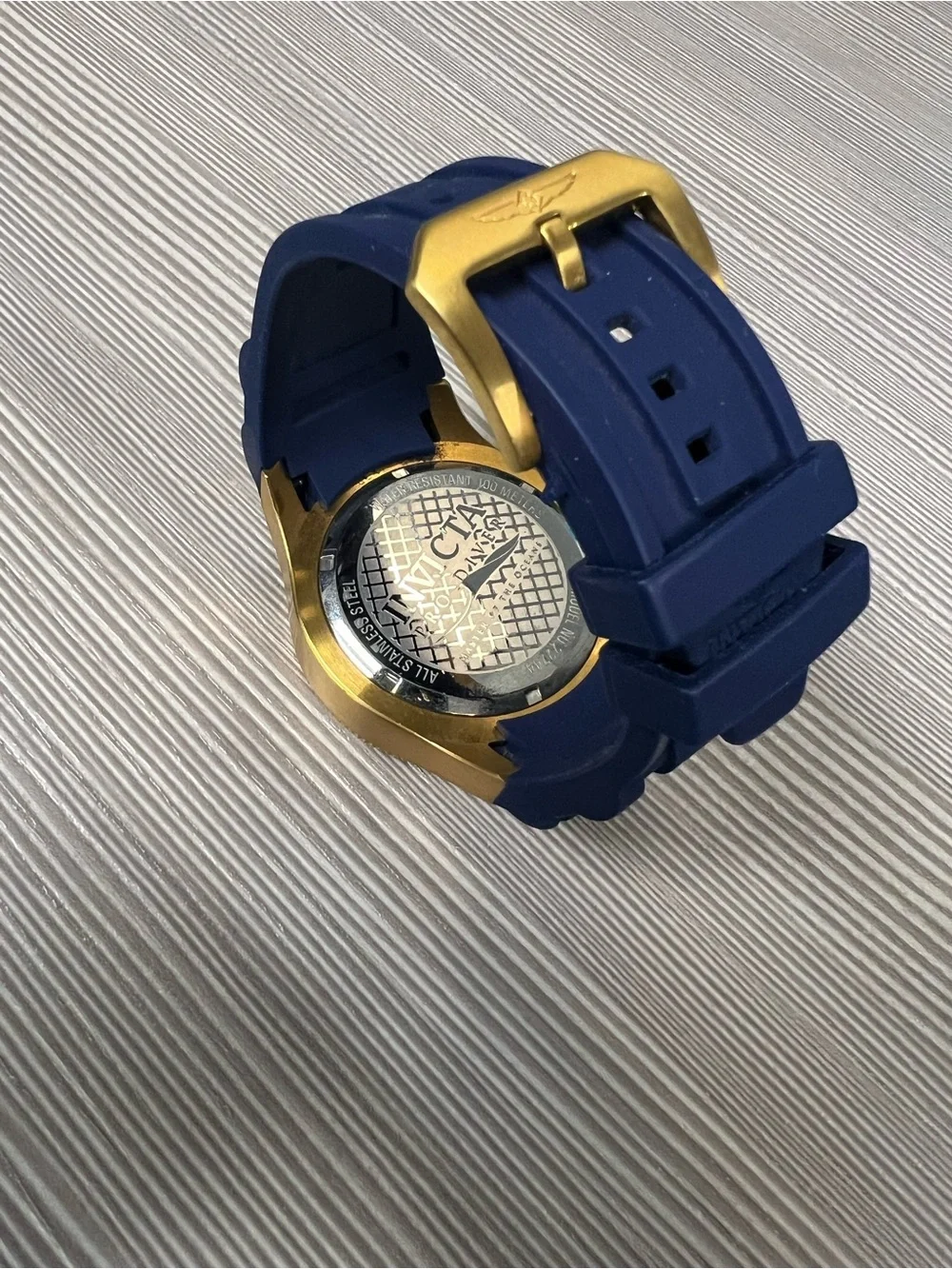 Invicta Gold-Tone Bezel Blue Dial Men's Watch with Blue Strap